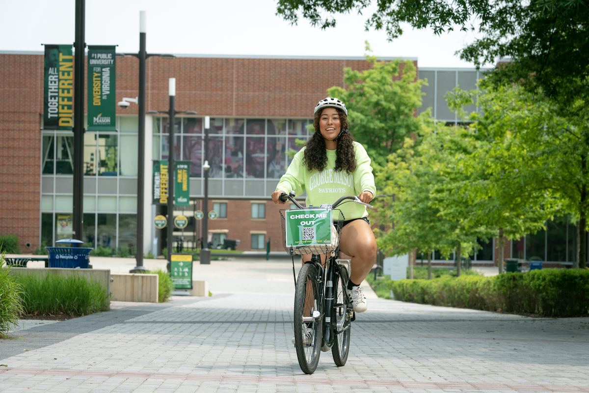 Students riding bikes to class on the Fairfax Campus.