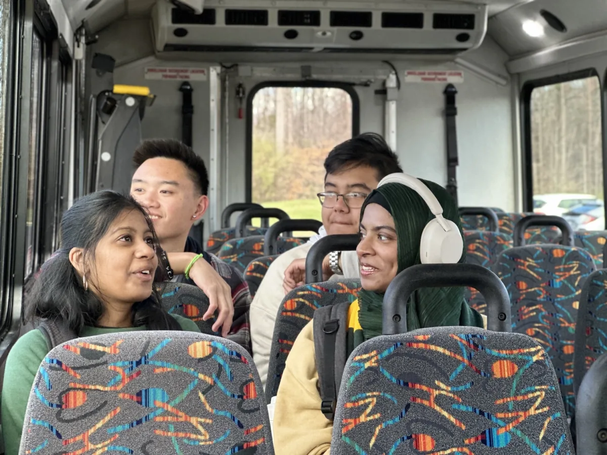 Students riding on the George Mason shuttle